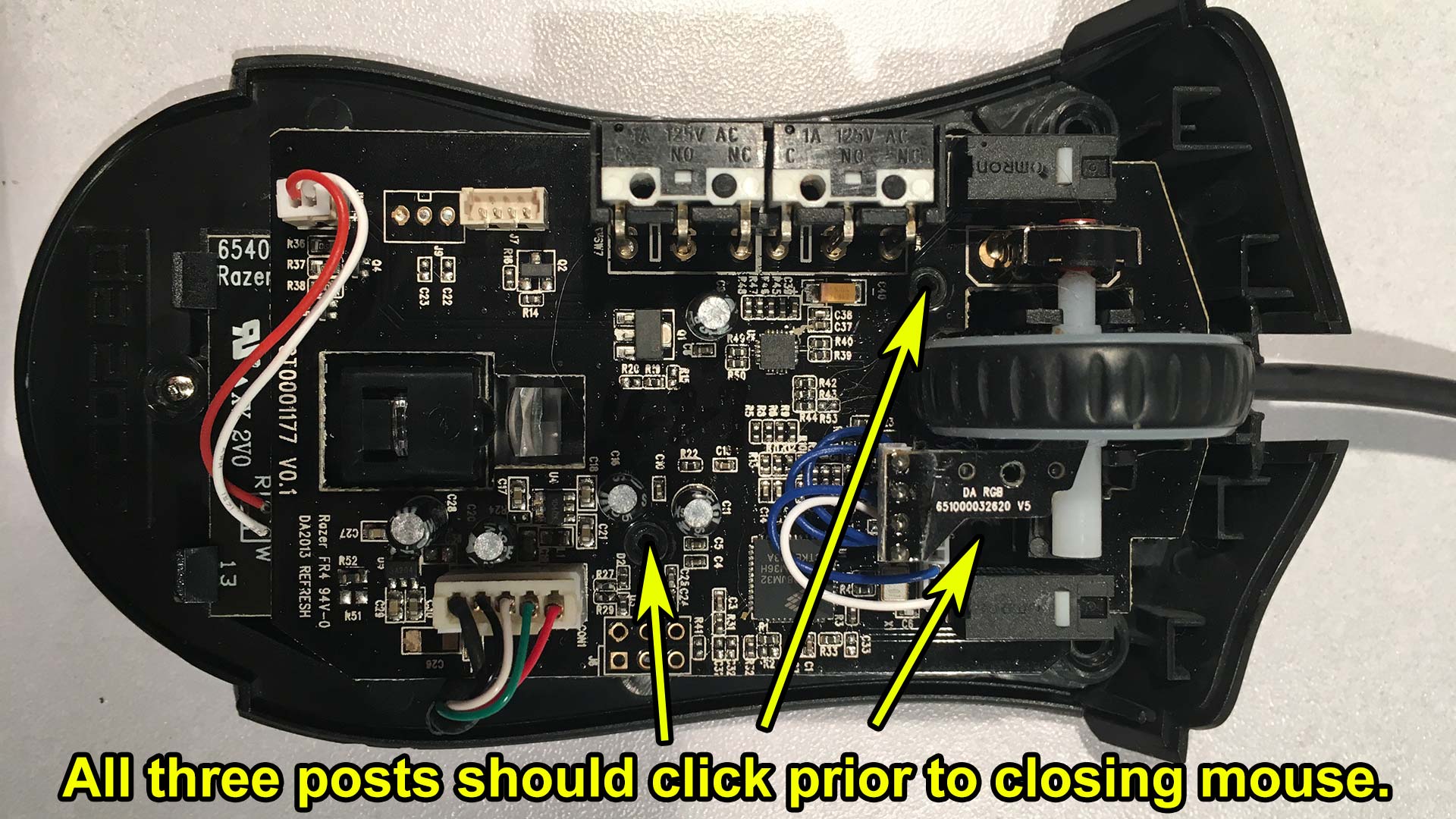 Razer Deathadder mouse assembly - Reseating cable and three posts.