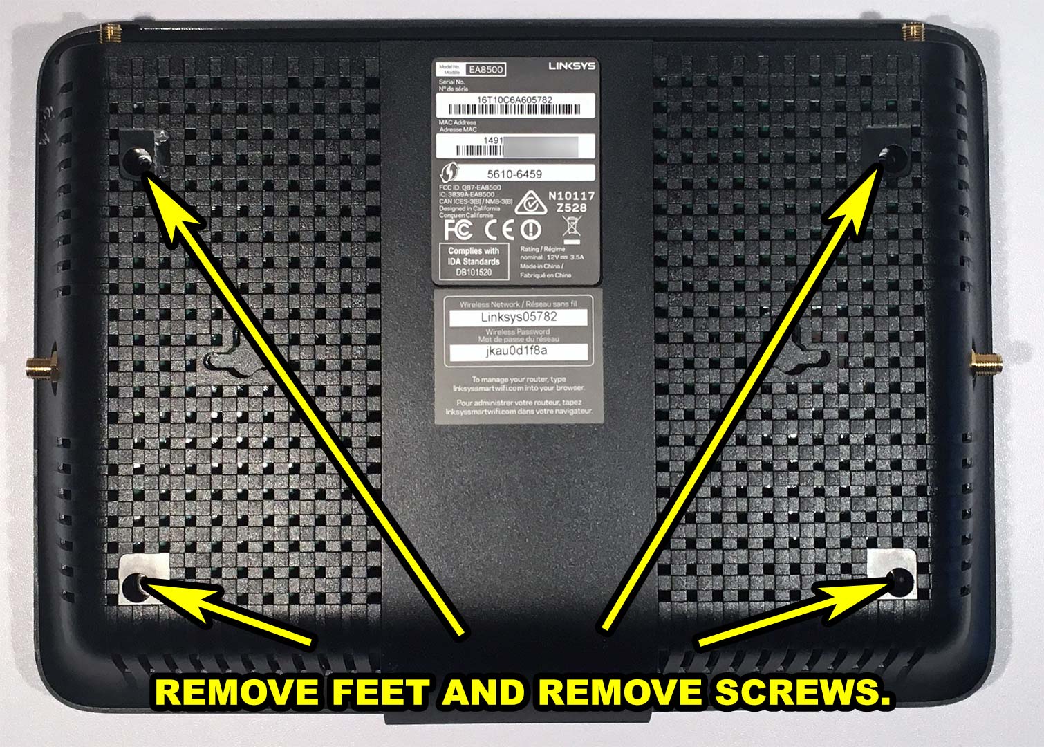 Removing feet and screws on the linksys E8500 router.