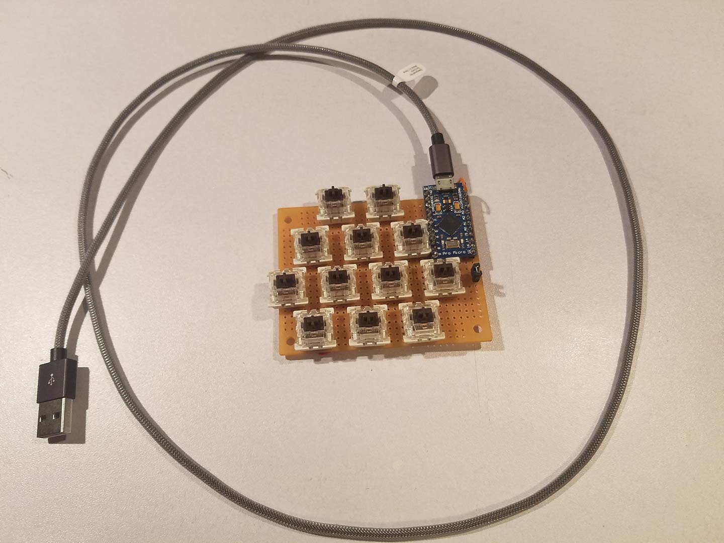 Completed circuit board and usb table test of the arduinoDECK.