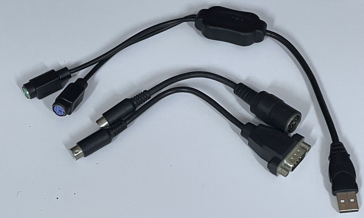 AT / RS232 - to PS2 - to Active USB adapter hell cables.